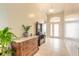 Entryway with tile flooring, antique furniture, and lots of natural light at 1155 Kilkenny Ln, Ormond Beach, FL 32174