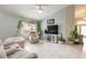 Relaxing living room with beige furniture and tile flooring at 1155 Kilkenny Ln, Ormond Beach, FL 32174