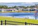 Community view with lake and homes at 126 Old Mill Pond Rd, Edgewater, FL 32141