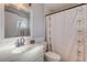 Clean bathroom with white vanity and shower/tub combo at 1732 Travelers Palm Dr, Edgewater, FL 32132