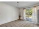 Bright dining area with sliding glass doors leading to the backyard at 1732 Travelers Palm Dr, Edgewater, FL 32132