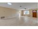 Bright living room with tile floors and a ceiling fan at 1732 Travelers Palm Dr, Edgewater, FL 32132