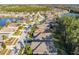 Aerial view of a house with a view of the surrounding neighborhood at 1763 Weeping Elm Cir, Port Orange, FL 32128