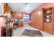 Guest bedroom with built-in murphy bed and shelving at 1763 Weeping Elm Cir, Port Orange, FL 32128