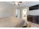 Main bedroom with ensuite bathroom and view into another room at 1763 Weeping Elm Cir, Port Orange, FL 32128