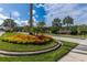 Royal Palm community entrance with landscaping at 1763 Weeping Elm Cir, Port Orange, FL 32128