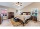 Large main bedroom with hardwood floors and ample dresser space at 1763 Weeping Elm Cir, Port Orange, FL 32128