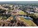 Aerial view showing a golf course community at 18459 Sw 66Th Loop, Dunnellon, FL 34432