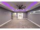 Bright bedroom featuring carpet, barn doors, and recessed lighting at 18459 Sw 66Th Loop, Dunnellon, FL 34432