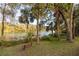 Serene riverfront park with bench seating at 18459 Sw 66Th Loop, Dunnellon, FL 34432