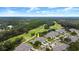 Aerial view of a lovely home situated in a desirable golf course community at 1957 Turnbull Lakes Dr, New Smyrna Beach, FL 32168