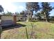 View of the back of the house and yard at 1975 Lake Dr, New Smyrna Beach, FL 32168