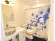 Bathroom with updated fixtures and a stylish shower at 1975 Lake Dr, New Smyrna Beach, FL 32168