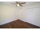 Bright bedroom with hardwood floors and double closet at 1975 Lake Dr, New Smyrna Beach, FL 32168