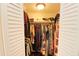 Spacious closet with ample hanging space and shelving at 1975 Lake Dr, New Smyrna Beach, FL 32168