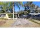 Front view of home and driveway at 1975 Lake Dr, New Smyrna Beach, FL 32168