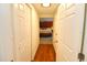 Hallway with doors leading to bedrooms and closets at 1975 Lake Dr, New Smyrna Beach, FL 32168