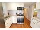 Modern kitchen with stainless steel appliances and granite countertops at 1975 Lake Dr, New Smyrna Beach, FL 32168