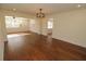 Open living area with hardwood floors and stylish lighting at 1975 Lake Dr, New Smyrna Beach, FL 32168