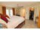 Main bedroom with king-size bed and walk-in closet at 1975 Lake Dr, New Smyrna Beach, FL 32168