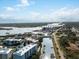 Aerial view of condos, boat docks, and the intercoastal waterway with ocean access at 2 Riverwalk Dr # 402, New Smyrna Beach, FL 32169