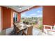 Relaxing balcony with seating and views of the surrounding landscape at 2 Riverwalk Dr # 402, New Smyrna Beach, FL 32169