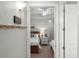 View from the hallway into the bedroom with two beds and beach-themed decor at 2 Riverwalk Dr # 402, New Smyrna Beach, FL 32169