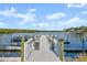 View of a boat dock and the surrounding scenic waterfront at 2 Riverwalk Dr # 402, New Smyrna Beach, FL 32169