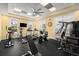 Community gym with ample cardio equipment, weights, and natural light at 2 Riverwalk Dr # 402, New Smyrna Beach, FL 32169