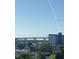 Water view of a bridge and waterfront building, seen from the property at 2 Riverwalk Dr # 402, New Smyrna Beach, FL 32169