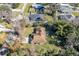 Aerial view of the home in a lush, tree-lined neighborhood at 2232 Swoope Dr, New Smyrna Beach, FL 32168