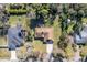 Aerial view of the home in a lush, tree-lined neighborhood at 2232 Swoope Dr, New Smyrna Beach, FL 32168