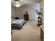 Main bedroom with ample space and carpet at 2259 Candlewood E Ln, New Smyrna Beach, FL 32168