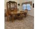 Bright dining room featuring a large table and hutch at 2259 Candlewood E Ln, New Smyrna Beach, FL 32168