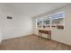 Bright living room with carpet and lots of natural light at 229 Columbus Ave, Daytona Beach, FL 32118