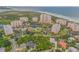 Oceanfront community featuring multiple buildings and lush landscaping at 263 Minorca Beach Way # 803, New Smyrna Beach, FL 32169