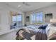 Bedroom with water views and sliding glass doors to balcony at 263 Minorca Beach Way # 803, New Smyrna Beach, FL 32169