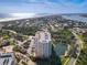 Aerial shot of the condo complex near the beach, offering incredible coastal proximity and views at 265 Minorca Beach Way # 204, New Smyrna Beach, FL 32169