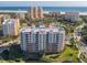 Expansive aerial shot of the beachfront condos, highlighting the upscale amenities and views at 265 Minorca Beach Way # 204, New Smyrna Beach, FL 32169