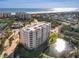 Stunning aerial view of the condo complex near the ocean, showcasing its prime location at 265 Minorca Beach Way # 204, New Smyrna Beach, FL 32169