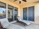 Balcony with lounge chairs perfect for relaxing at 265 Minorca Beach Way # 204, New Smyrna Beach, FL 32169