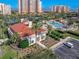 Community clubhouse with Spanish tile roof at 265 Minorca Beach Way # 204, New Smyrna Beach, FL 32169