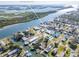 Bird's-eye view showcasing home's waterfront location and neighborhood at 275 Randle Ave, Oak Hill, FL 32759