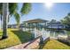 Private dock with covered seating area, perfect for relaxing by the water at 275 Randle Ave, Oak Hill, FL 32759