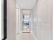 Light and airy hallway with mirrored closet doors at 2967 S Atlantic Ave # 801, Daytona Beach Shores, FL 32118