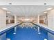 Tranquil indoor pool with high ceilings and natural light at 2967 S Atlantic Ave # 801, Daytona Beach Shores, FL 32118