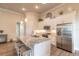 Modern kitchen featuring stainless steel appliances and granite countertops at 3012 Portofino Blvd, New Smyrna Beach, FL 32168