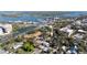 An aerial perspective of the community close to the water and a nearby shopping center at 314 Hillman St, New Smyrna Beach, FL 32168