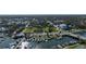 Overhead view of a charming waterfront community, showcasing the boats and the surrounding neighborhood at 314 Hillman St, New Smyrna Beach, FL 32168