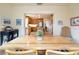 Inviting dining area with seamless flow to the kitchen, creating an ideal space for meals and gatherings at 314 Hillman St, New Smyrna Beach, FL 32168